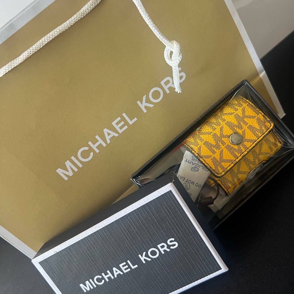 Brand new Michael Kors Yellow butter AirPod keychain case
